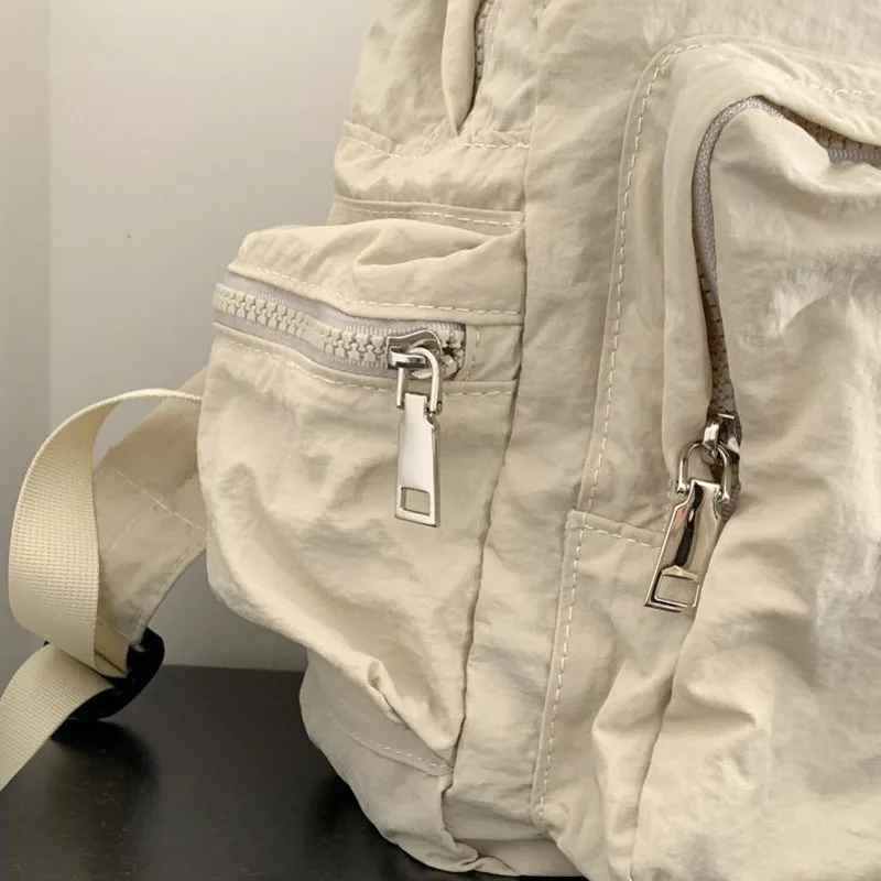 Hylhexyr жени плътен цвят прост найлон раница ученически чанти случайни меки пътуване спорт раница с цип външен джоб Изображение 2
