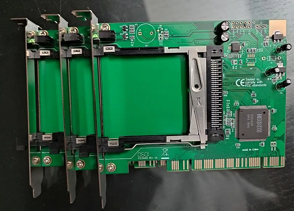 PCI към PCMCIA P2CB485 Нова PCI-PCMCIA PC карта ATA P2 A2 карта SRAM карта четец поддържа 16/32bit CARDBUS functioRicoh R5C485 чип Изображение 0